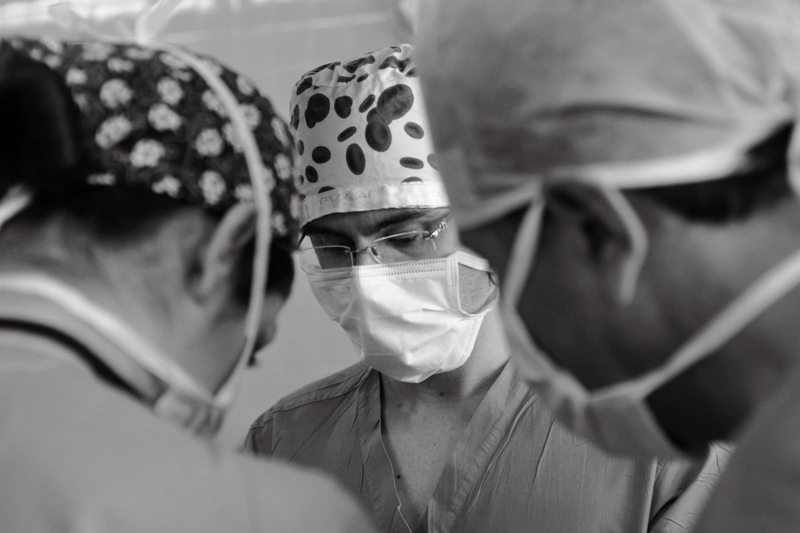 Single Port Robotic Surgery - surgical team working together during an operation